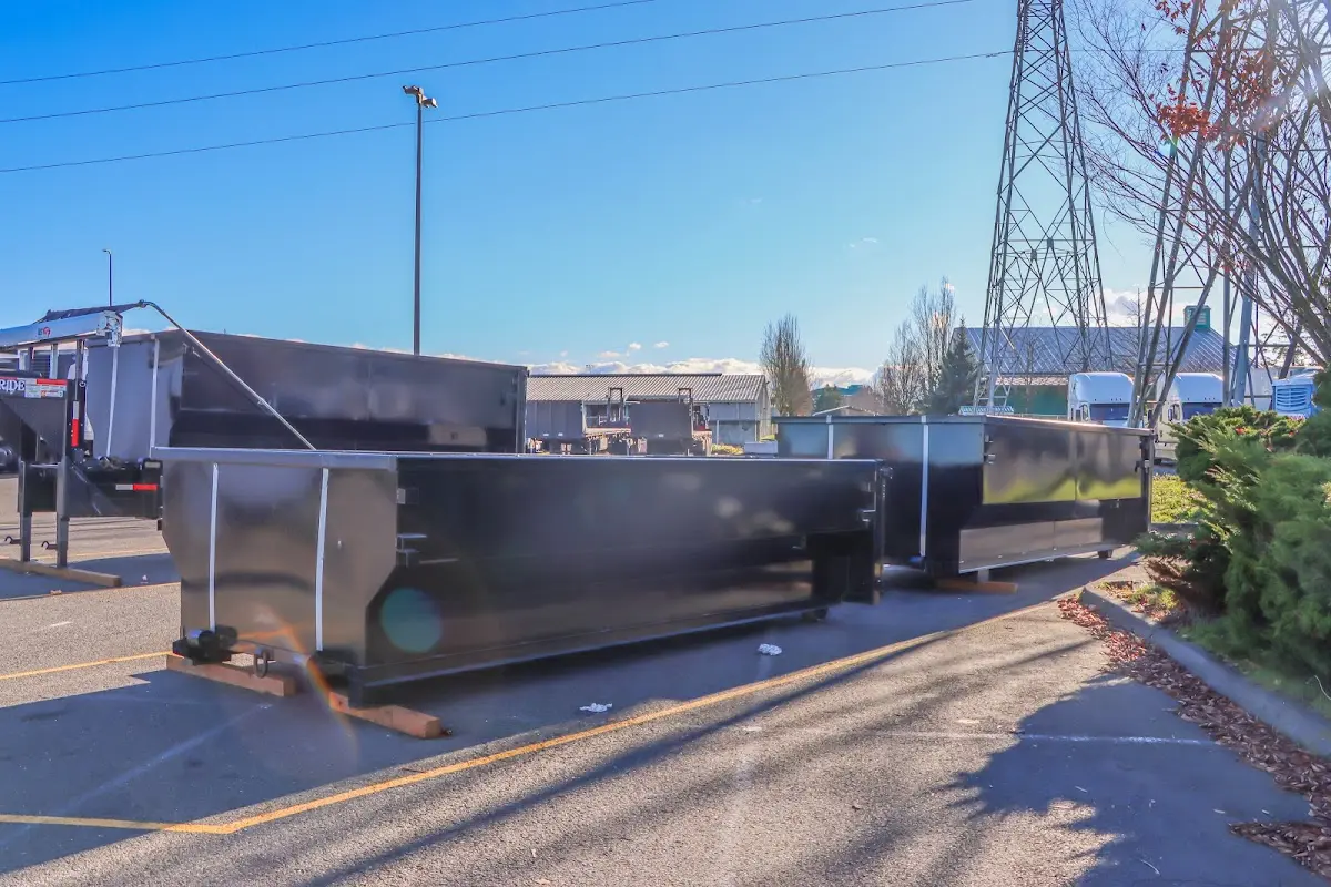 Roll-off dumpster ready for waste disposal at job site for Construction Dumpster Rental in Davis